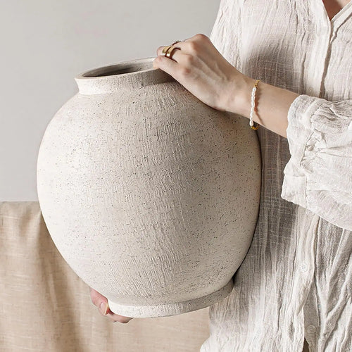 Large white sandstone ceramic round floor vase, decorative ceramic vase by The Finishing Touch Decor with smooth surface.