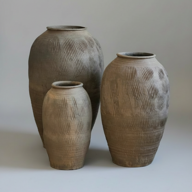 Large rustic terracotta floor vase from The Finishing Touch Decor, decorative Zen-inspired terracotta vase for home decor.