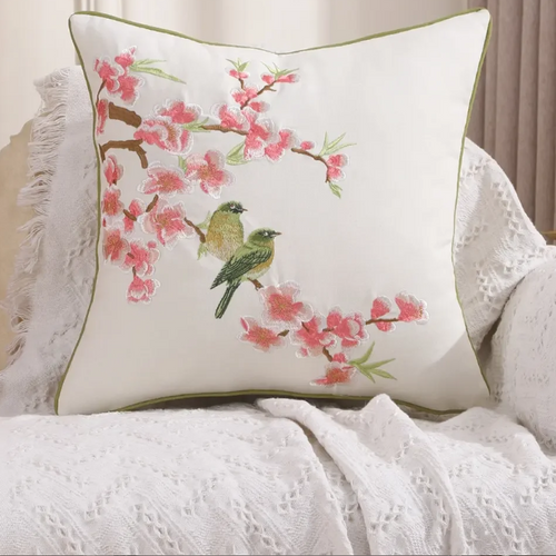 Nature and bird embroidered farmhouse throw pillow cover by The Finishing Touch Decor, featuring detailed bird and plant embroidery.