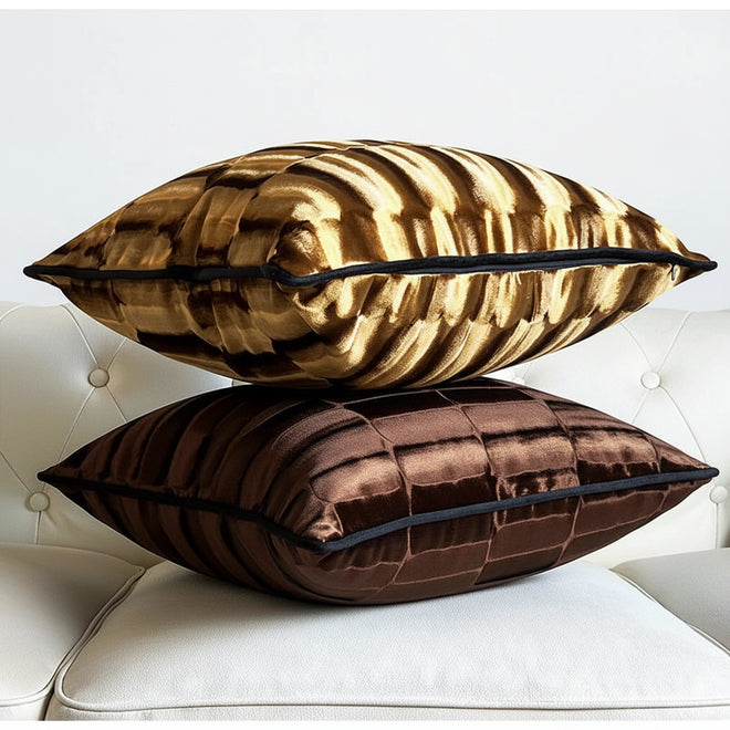 Gold-toned ribbed velvet throw pillow case with modern abstract design, decorative cushion cover for stylish home decor.