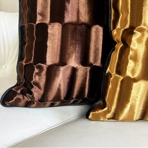 Luxury gold-toned ribbed velvet throw pillow case with modern abstract design for decorative home decor by The Finishing Touch Decor.