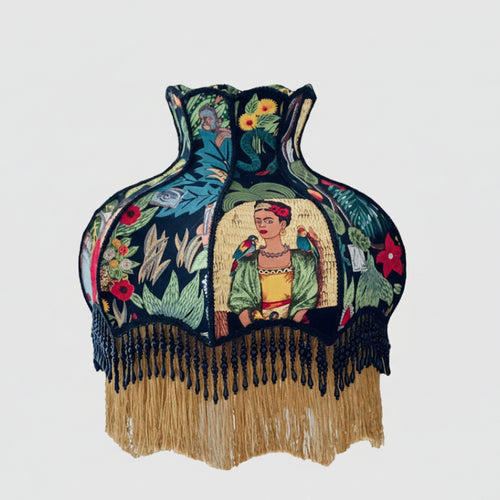 Eclectic Frieda Kahlo and jungle pattern lampshade by The Finishing Touch Decor, featuring vibrant, artistic floral and portrait design.