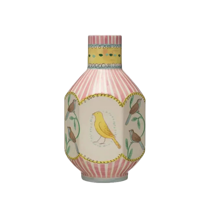 Decorative vase with bird design on a light gray background.