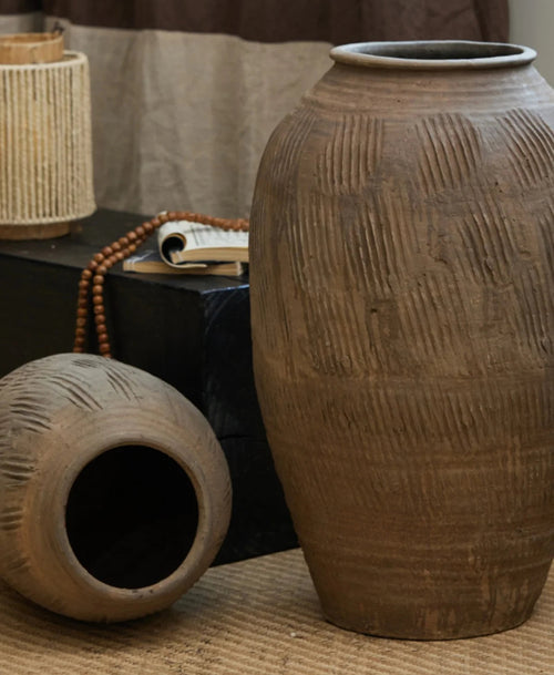 Rustic Zen large terracotta floor vase from The Finishing Touch Decor, decorative vase with a natural earthy finish.
