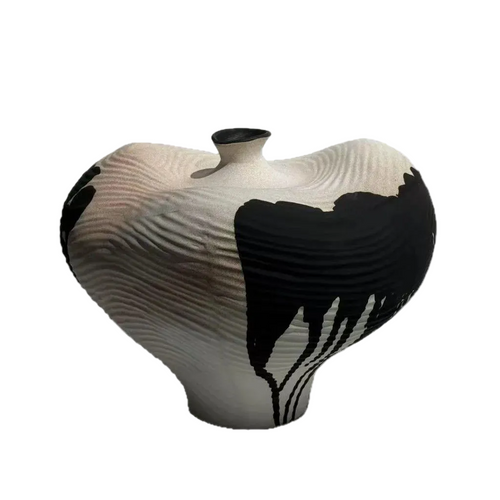 Handmade decorative vase with irregular shape and ink drip design, perfect for modern home decor.