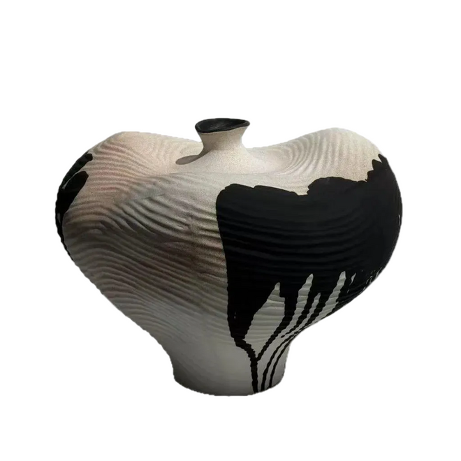 Handmade decorative vase with irregular shape and ink drip design, perfect for modern home decor.