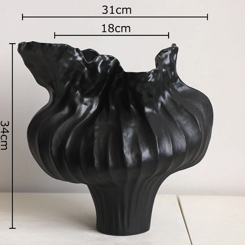 Irregular drip Wabi Sabi porcelain ceramic vase with a rustic, artistic design, perfect for decorative home accents