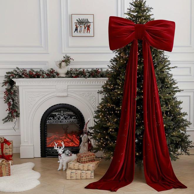 Large red velvet Christmas holiday decorative bow from The Finishing Touch Decor, measuring 78 inches for festive holiday decor.