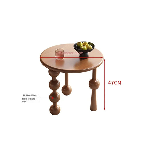 Scandinavian solid rubber wood small side table with creative design, ideal for living room or sofa side setup.