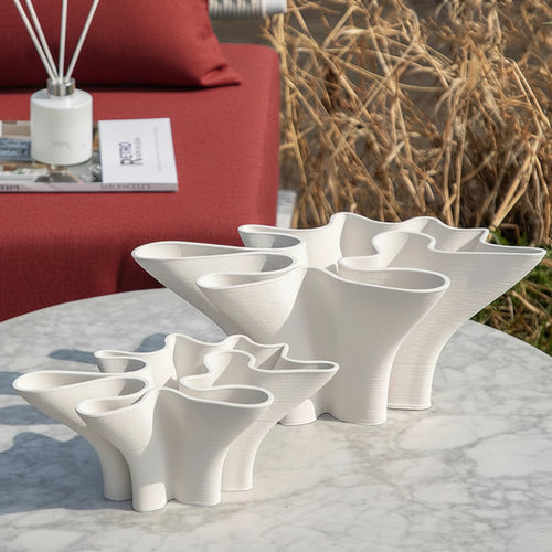 White ceramic Scandi vase with sculpted wave design, decorative vase from The Finishing Touch Decor.