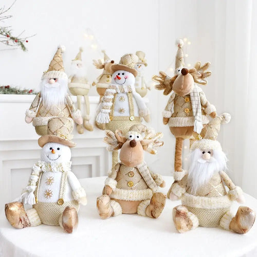 Set of decorative Christmas figures including snowmen and reindeer on a white surface.