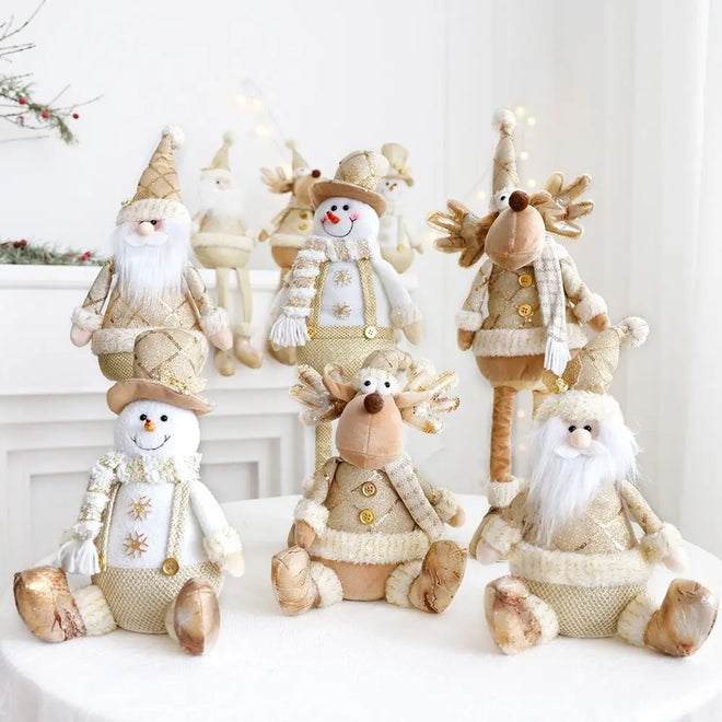 Set of decorative Christmas figures including snowmen and reindeer on a white surface.