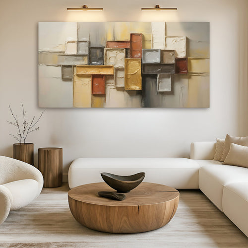 Modern living room with abstract art, wooden coffee table, and white sofa.