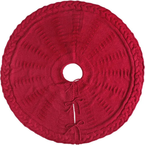 Red knitted Christmas tree skirt on a white background