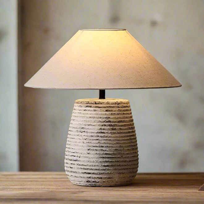 Rustic metal ceramic table lamp with fabric shade and remote control, by The Finishing Touch Decor, for cozy lighting decor.