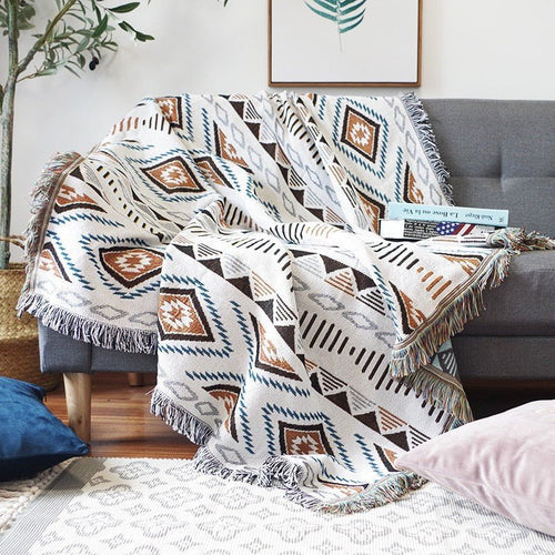 Large colorful boho ethnic throw blanket by The Finishing Touch Decor, LLC, featuring vibrant patterns and bold bohemian design.