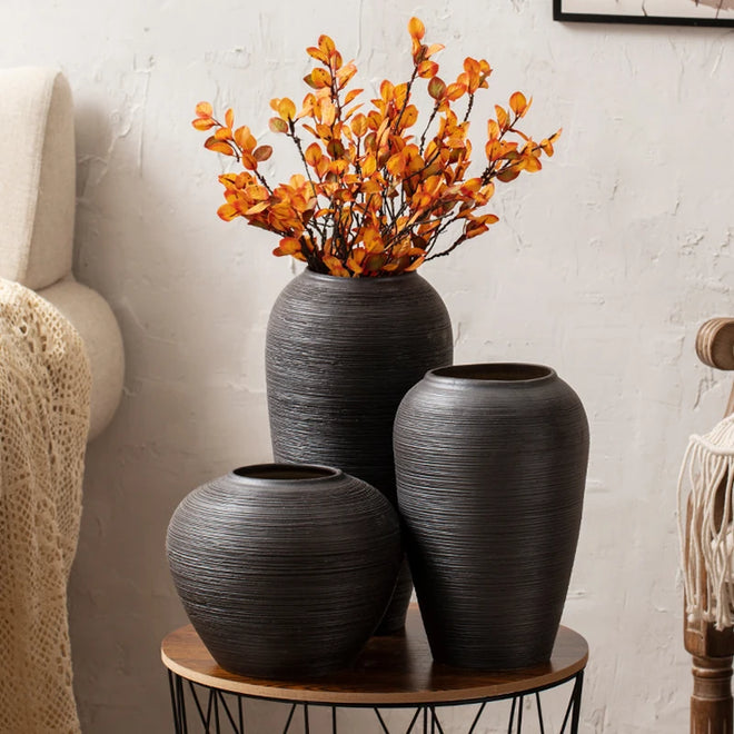 Scandinavian black Wabi Sabi Jingdezhen ceramic decorative vases with minimalist, imperfect aesthetic, crafted by The Finishing Touch Decor, LLC.