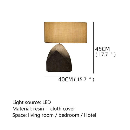 Dark Japandi woodgrain resin table lamp with minimalist design and button switch, blending modern lighting with natural wood-inspired style.