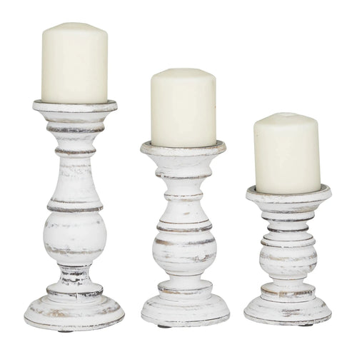 Set of three white vintage finish wood candle holders, decorative table art with distressed distressed look from The Finishing Touch Decor.
