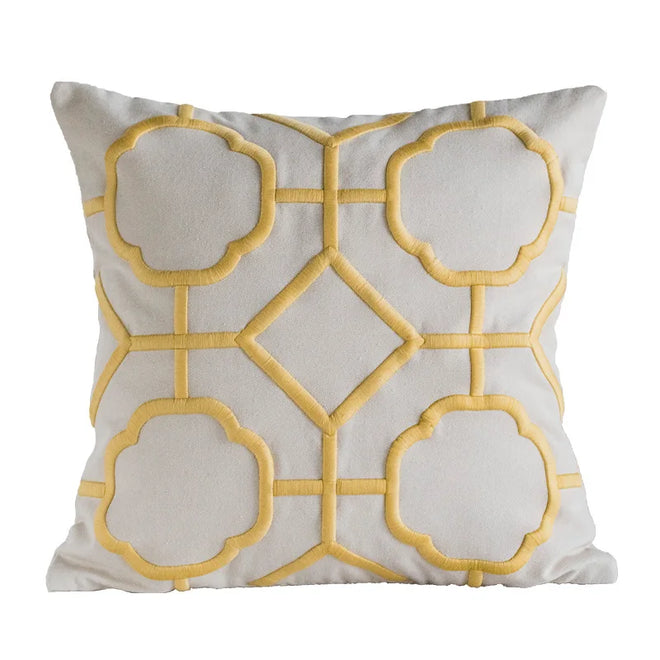 Embroidered linen throw pillow cover with a quatrefoil pattern, designed by The Finishing Touch Decor for stylish home decor.
