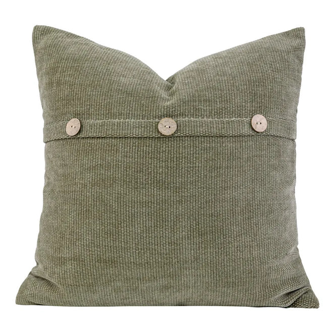 Olive green textured throw pillow cover from The Finishing Touch Decor, 45x45cm, contemporary Nordic style, soft woven fabric.
